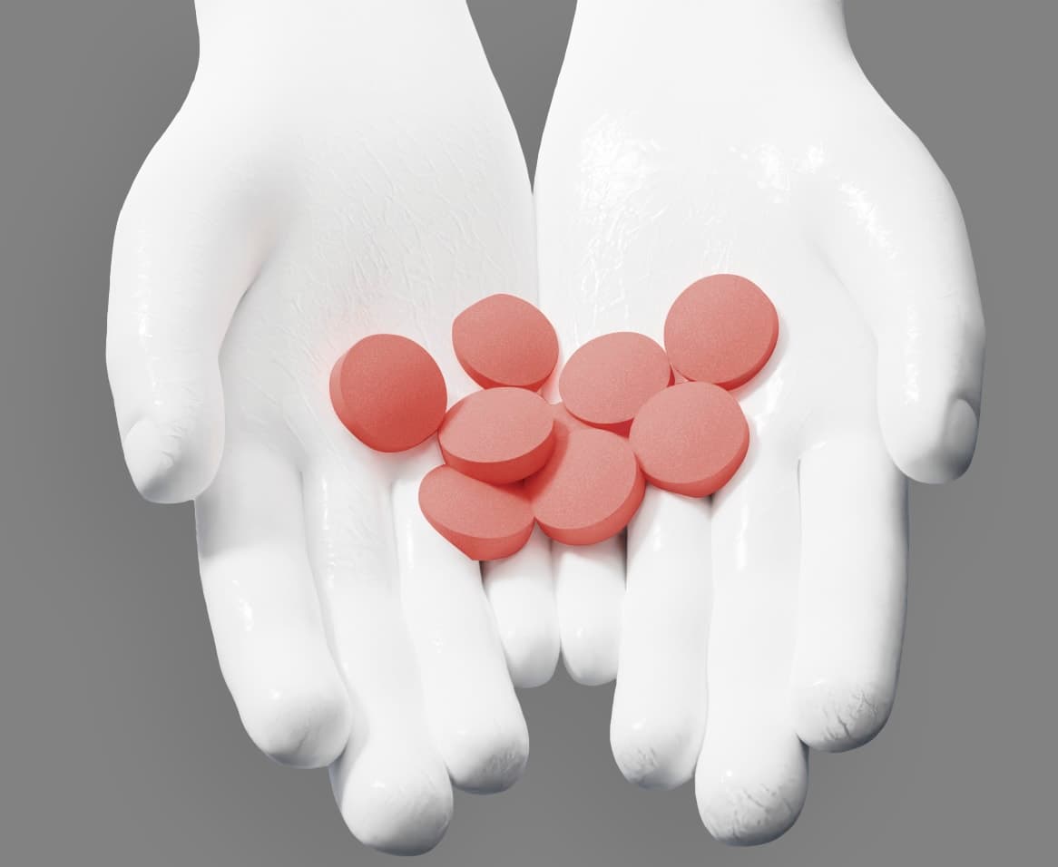 Pastilles colorantes dans les mains